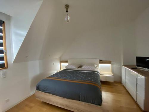 Säng eller sängar i ett rum på TY GWEN-GLAZIK Sublime Villa Moderne, Vue mer