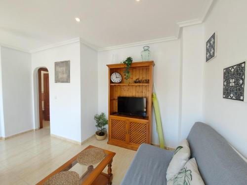 TV a/nebo společenská místnost v ubytování Apartamento Torremar Natura - Vera Playa Zona Naturista