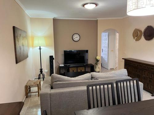 TV a/nebo společenská místnost v ubytování Gemütliches Bungalow in Denia Spanien