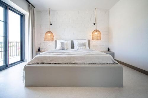 Cama o camas de una habitación en Derin Alacati