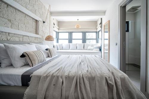 Cama o camas de una habitación en Derin Alacati