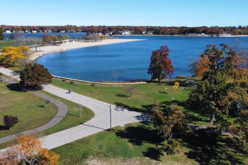 a view of a park with a body of water at Entire House Right In Stamford's Heart in Stamford