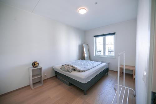 Llit o llits en una habitació de Utsiktsleilighet i Bydel Bjerke