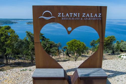 a sign for the aktion jahlil resort and marmaris at Zlatni Zalaz,Apartments,Supetarska Draga in Supetarska Draga