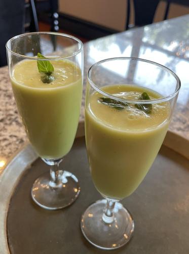 two glasses of orange juice on a tray at White Sails Inn in Kennebunk