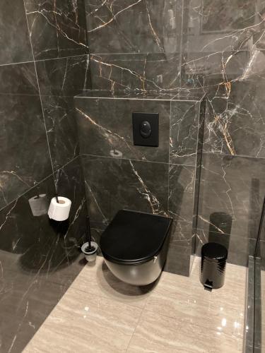 Koupelna v ubytování Komfortowy Apartament w Młynie Mrągowo