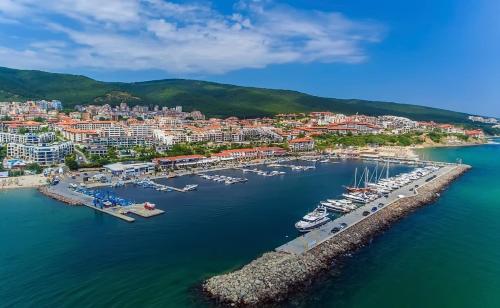 an aerial view of a harbor with boats in the water at Dolce Vita Blue Boho, Premium Apartment with seaview in Sveti Vlas