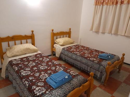 Katil atau katil-katil dalam bilik di Mi Casa por los Caminos del Vino