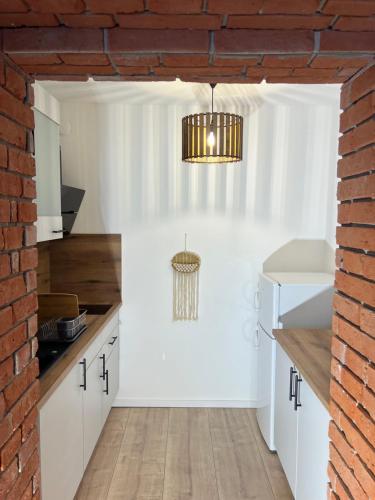 Sofia Apartment & Zimmer Sillweg Nähe Rebull Ringにあるキッチンまたは簡易キッチン