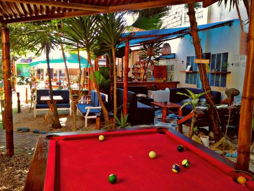 a pool table with balls on top of it at Hotel MAHAI in Olón