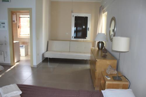Un lugar para sentarse en Avia Holiday Homes