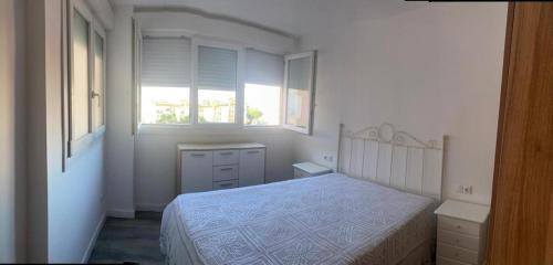 Posteľ alebo postele v izbe v ubytovaní Apartamento María Burgos
