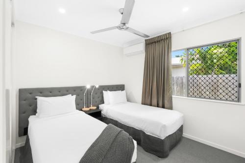 Ένα ή περισσότερα κρεβάτια σε δωμάτιο στο Blue Lagoon Villas