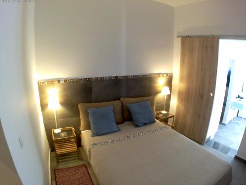 Ένα ή περισσότερα κρεβάτια σε δωμάτιο στο LILIUM HOUSE PALEKASTRO
