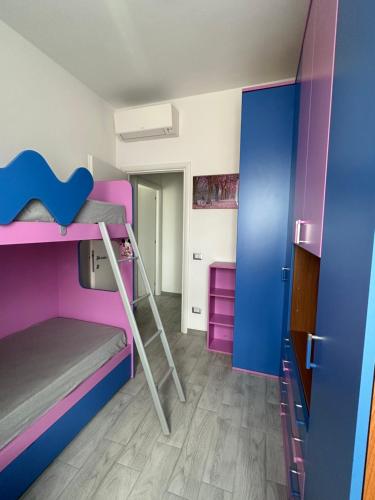 a room with two bunk beds and a hallway at Casa Saida in Rome