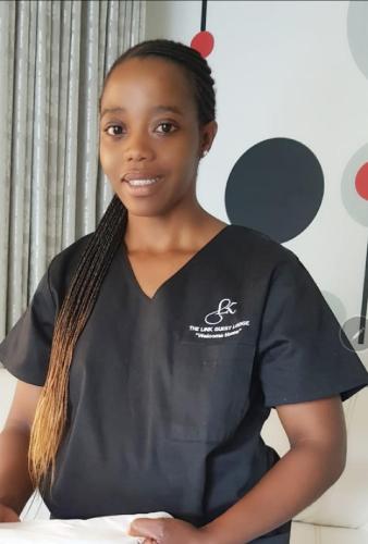 a woman wearing a black shirt with araid at The Link on Bonsai in Kempton Park