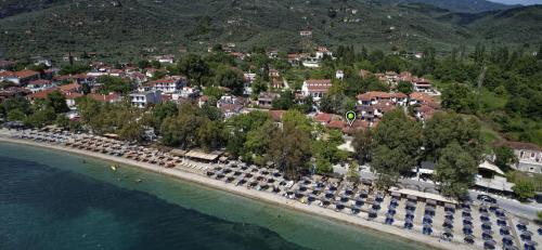 an aerial view of a resort on a beach at Enalion Hotel in Kala Nera