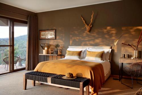 Katil atau katil-katil dalam bilik di Matomo Safari Lodge