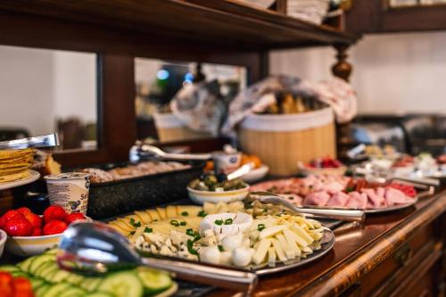 a buffet line with many different types of food at Sv. Hubertus in Český Krumlov