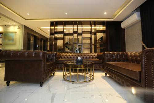 Posezení v ubytování The Orchard Hotel Lahore