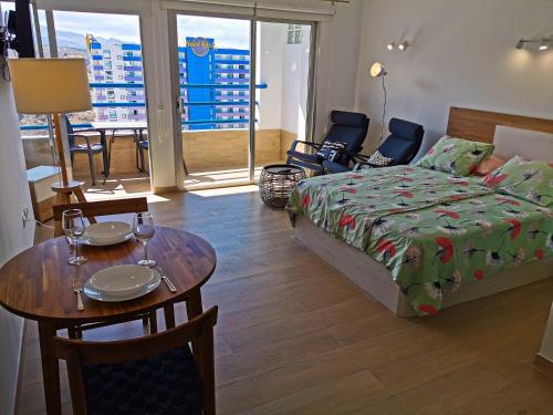 מיטה או מיטות בחדר ב-Apartments Paraíso del Sur