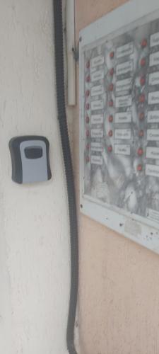 a close up of a cord hooked up to a wall at Апартамент Медика in Ruse