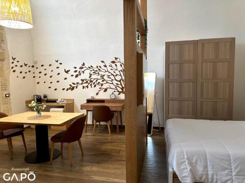 Postel nebo postele na pokoji v ubytování GAPO Rooms