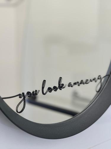 a magnifying glass with the words you look amazing at Sea view penthouse Private rooftop jacuzzi in Eilat