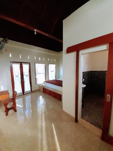 Katil atau katil-katil dalam bilik di Sumatra Expedition Lodge