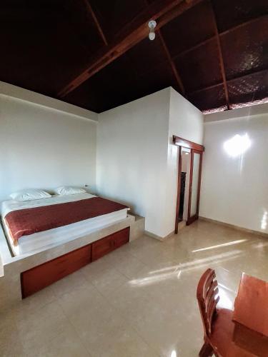 Katil atau katil-katil dalam bilik di Sumatra Expedition Lodge