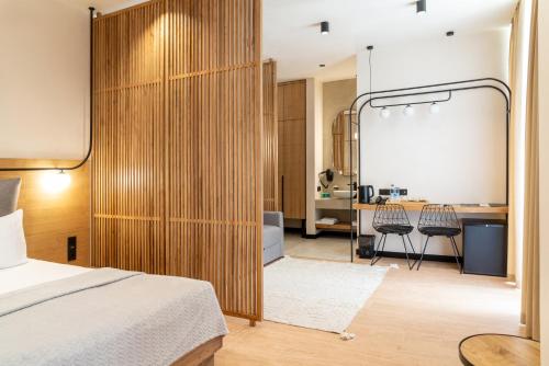 Voodi või voodid majutusasutuse Bukville Hotel & SPA toas