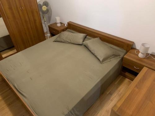 Ein Bett oder Betten in einem Zimmer der Unterkunft Apartmani Borić