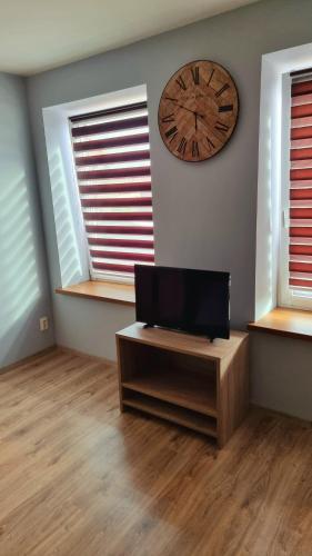 Televisyen dan/atau pusat hiburan di Apartament G66