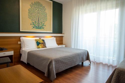 Postel nebo postele na pokoji v ubytování Hotel Crystal