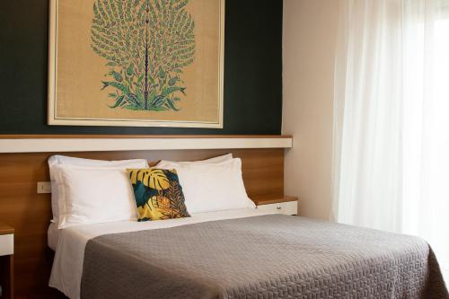 Postel nebo postele na pokoji v ubytování Hotel Crystal