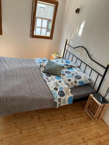 Ένα ή περισσότερα κρεβάτια σε δωμάτιο στο Ferienhaus Ankerpunkt