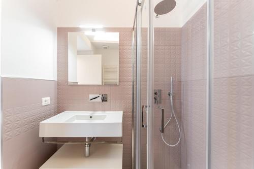 a bathroom with a sink and a shower at La casa sul muraglione in Termoli