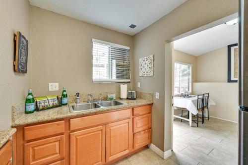a kitchen with a sink and a counter top at Inviting Poway Studio with Patio and Gas Grill! in Poway