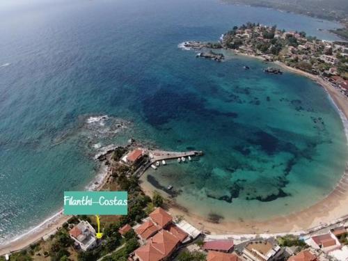 an aerial view of a beach and the ocean at Filanthi CostaS in Stoupa
