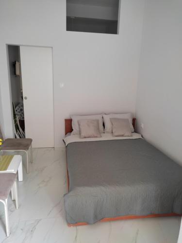 Postel nebo postele na pokoji v ubytování M2 - Maraki Apartments