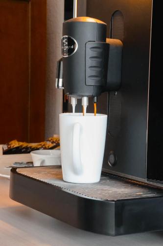 Set per la preparazione di tè e caffè presso Parkhotel Beatenberg