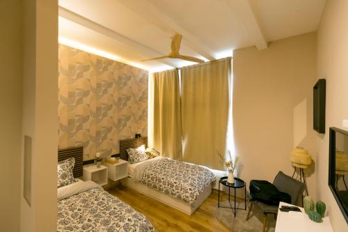 En eller flere senger på et rom på Golden Dove Luxury Aparts
