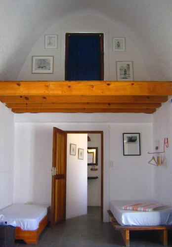Ένα ή περισσότερα κρεβάτια σε δωμάτιο στο Alternative Space B & B