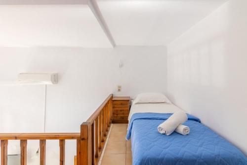 Ένα ή περισσότερα κρεβάτια σε δωμάτιο στο Joanna Apartments 