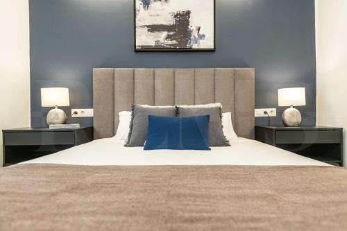 Posteľ alebo postele v izbe v ubytovaní Serene & spacious apartment - Center by REMS