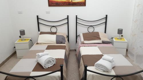 Katil atau katil-katil dalam bilik di Holiday house Isabel