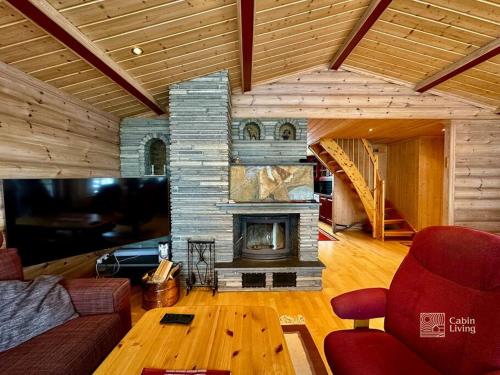 TV a/nebo společenská místnost v ubytování Large cabin Sjusjøen best view, sauna, ski inout