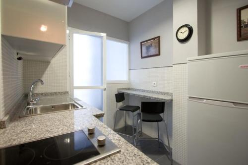 A kitchen or kitchenette at Macarena Flat