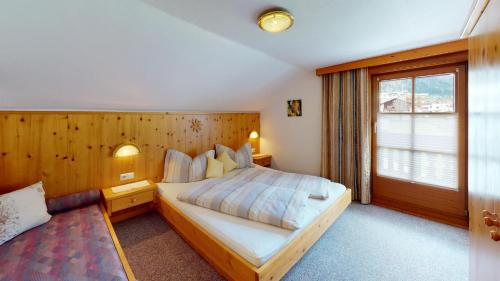 Ένα ή περισσότερα κρεβάτια σε δωμάτιο στο Julach Haus Apartment
