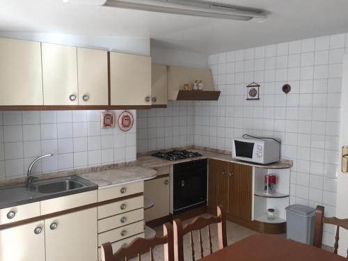 Kuchyň nebo kuchyňský kout v ubytování PARAISO RIAS BAIXAS IV
